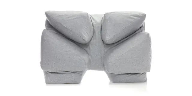 The arm tunnel from the side, the arm lying along the bed through the pillow