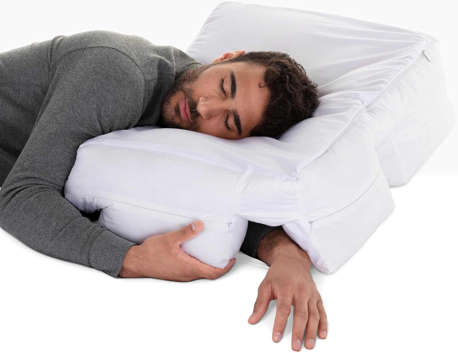 Man sleeping on his side with the Wife Pillow arm-tunnel design