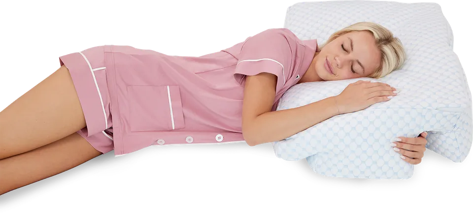 Wife Pillow 2.0 side sleeper pillow, a woman asleep on her side with her arm through the arm tunnel